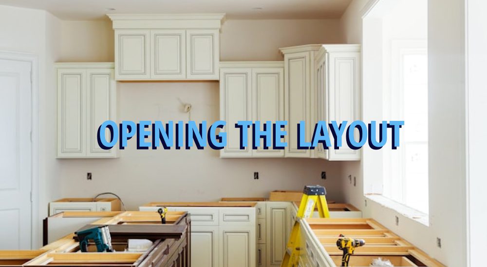 Remodeled kitchen, caption reading 'opening the layout'